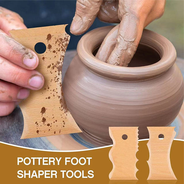 Person using a pottery foot shaper tool on a clay pot with a blurred background