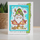 Greeting card with a gnome illustration and text on a white background