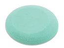 Round green sponge on a white background