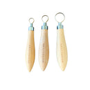 Three wooden tools with metal ends on a white background