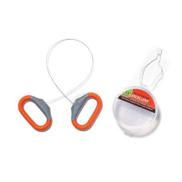 Retractable fishing line with orange and gray handle on a white background