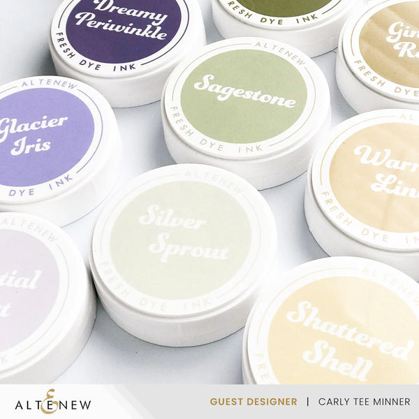 Collection of Altenew ink pads with various colors and names on a white background