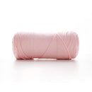 Pink skein of yarn on a white background