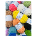 Assorted colorful yarn balls with 'Polar Puff' labels on a white background