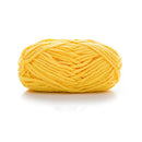 Yellow yarn ball on a white background