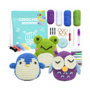 Crochet kit with yarn, hooks, and crochet toys on a white background