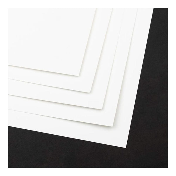 White paper sheets on a black background