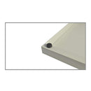 Corner of a whiteboard with a black marker cap on a white background