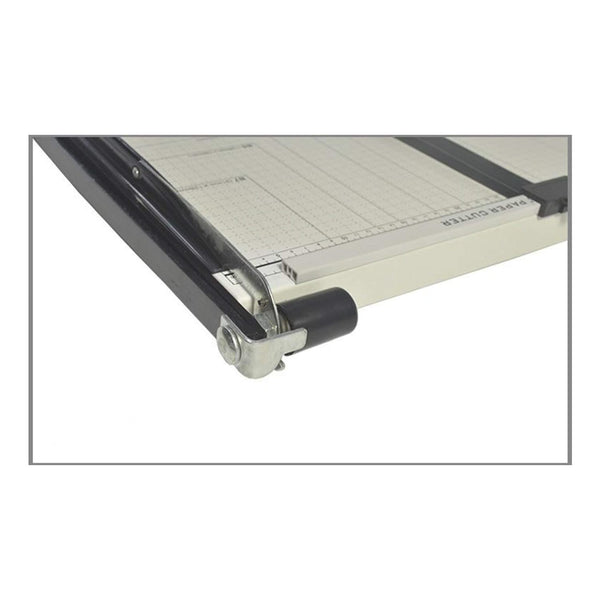  Guillotine paper cutter with a white sheet of paper on a white background