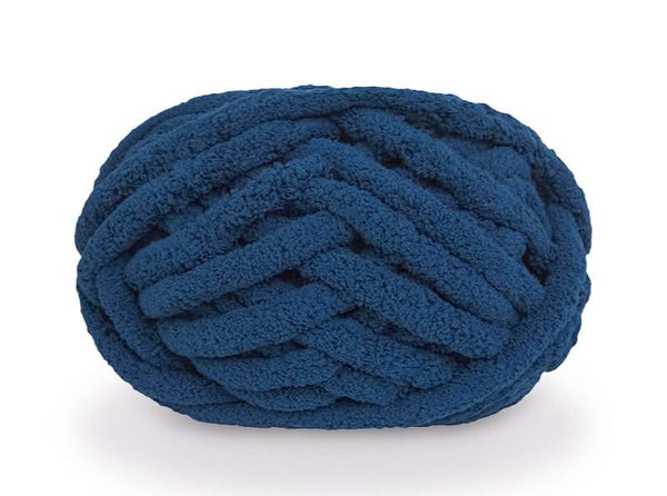 Blue braided knot pillow on a white background