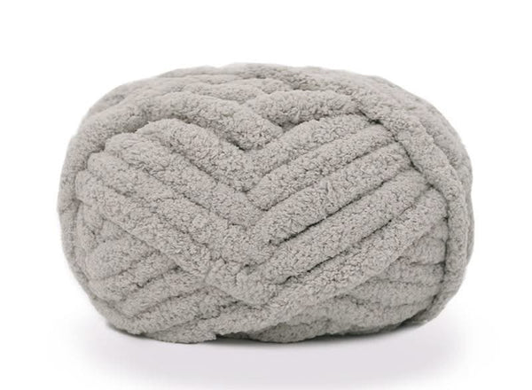 Gray textured ottoman on a white background