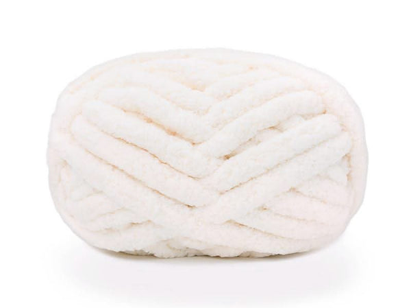 Ball of white yarn on a white background