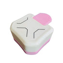 White and pink rectangular object with black lines on a white background